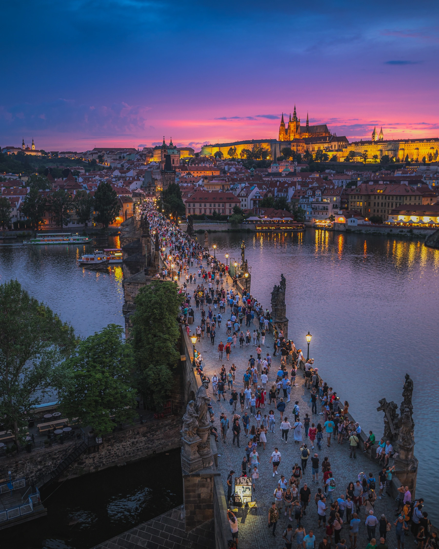 Charles Bridge and Prague Castle at sunset, photographed from the Old Town bridge tower